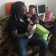 Baby Ethan Muendo with his father, KBC journalist Jonathan Muendo (Twitter)