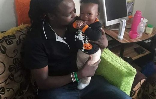 Baby Ethan Muendo with his father, KBC journalist Jonathan Muendo (Twitter)