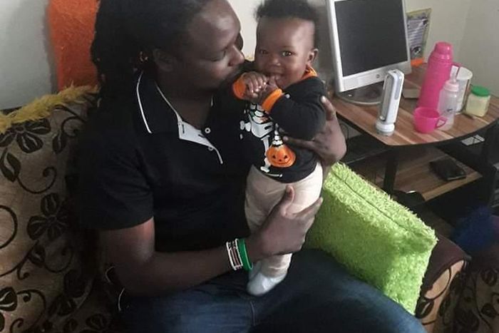 Baby Ethan Muendo with his father, KBC journalist Jonathan Muendo (Twitter)