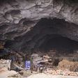 Zhongdong village, where a group of 18 families live inside an enormous natural cave with all the modern conveniences, like electricity
