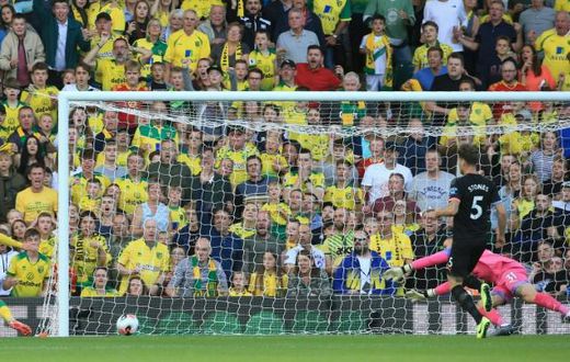 Todd Cantwell (left) scores Norwich's second goal in a thrilling 3-2 win over Manchester City