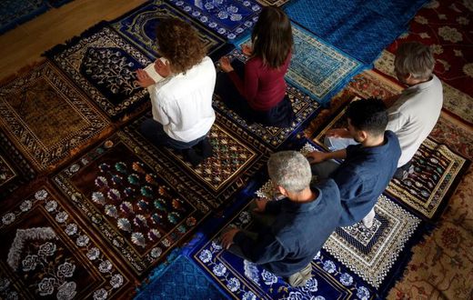 Eva Janadin, left, and Anne-Sophie Monsinay leading prayers in Paris on September 7, 2019