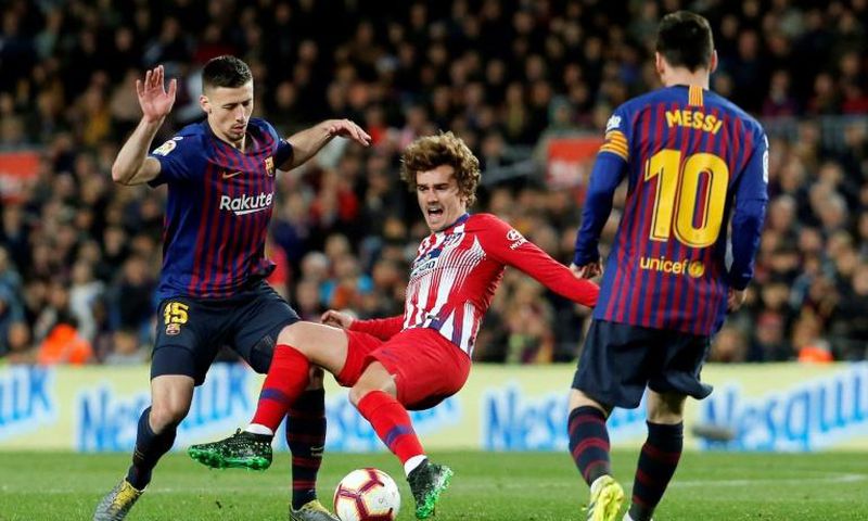 (FILES) Antoine Griezmann coming up against Lionel Messi and Barcelona last season. Now the World Cup winner will hope to settle in quickly at the club he rejected a year ago