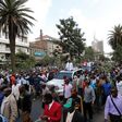 Kenyan opposition leader of the Coalition for Reforms and Democracy (CORD), Raila Odinga (C) leads his supporters during a protest near the premises hosting the headquarters of Independent Electoral and Boundaries Commission (IEBC) to demand the disban...