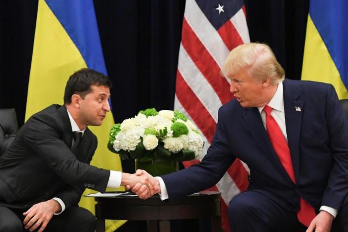 US President Donald Trump and Ukrainian President Volodymyr Zelensky shake hands during a meeting in New York on September 25, 2019, on the sidelines of the United Nations General Assembly