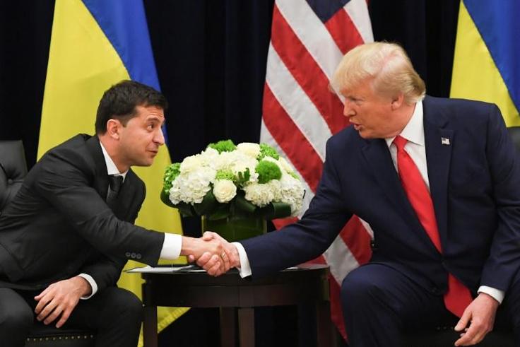 US President Donald Trump and Ukrainian President Volodymyr Zelensky shake hands during a meeting in New York on September 25, 2019, on the sidelines of the United Nations General Assembly