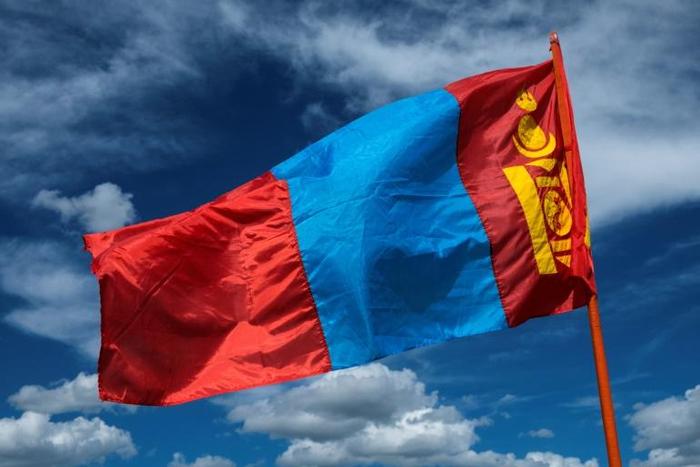 Mongolia's former intelligence chief is on trial accused of ordering the torture of two people who confessed to murdering the leader of a 1990 democratic movement