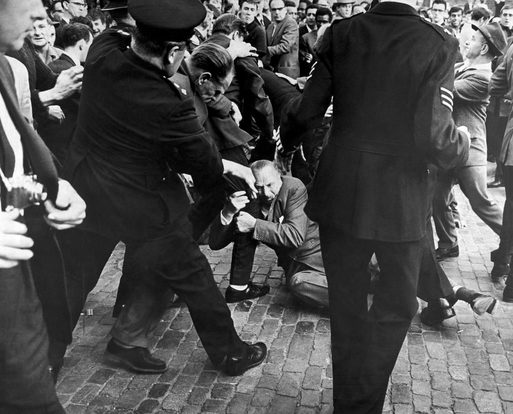 Mosley is attacked in 1962 during a rally. Police closed the rally within the first three minutes.