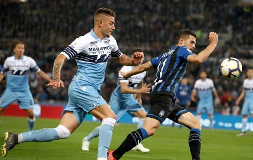 Lazio's Sergej Milinkovic-Savic (L) broke through three minutes after coming on as a late substitute.