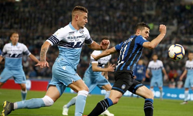 Lazio's Sergej Milinkovic-Savic (L) broke through three minutes after coming on as a late substitute.
