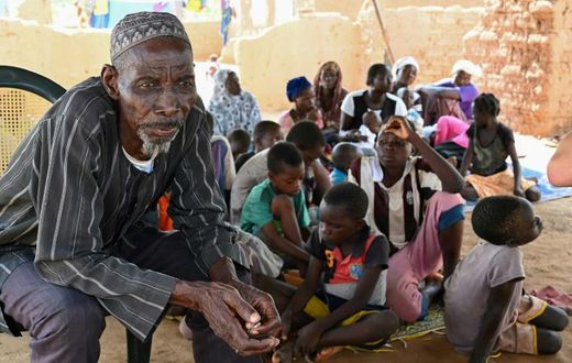 'We have swallowed our shame': Belen Boureima, 74, and members of his family