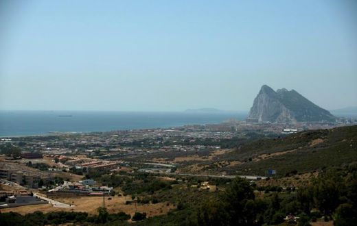 Gibraltar is a small peninsula attached to Spain that is a British territory home to around 30,000 people
