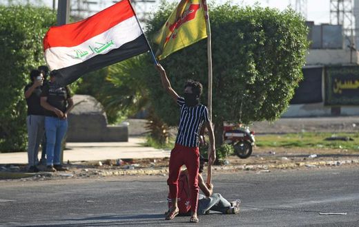 After a week of violent protests in Iraq, hardline Shiite factions in Baghdad are looking to consolidate power, experts say.