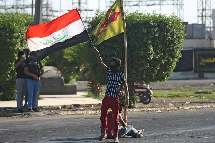 After a week of violent protests in Iraq, hardline Shiite factions in Baghdad are looking to consolidate power, experts say.