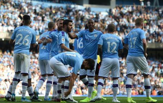 Manchester City celebrate another goal in their 8-0 rout of Watford