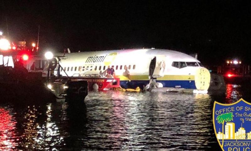 Plane skids off Jacksonville runway into river