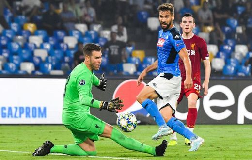 Fernando Llorente makes sure of Napoli's win over Liverpool after a Dries Mertens penalty put them ahead against the reigning European champions