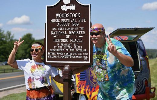 The original site of the 1969 Woodstock festival is becoming a sea of tie-dye and peace signs once more, as one-time festivalgoers celebrate the 50th anniversary of the pop culture milestone