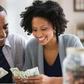 a couple counting money