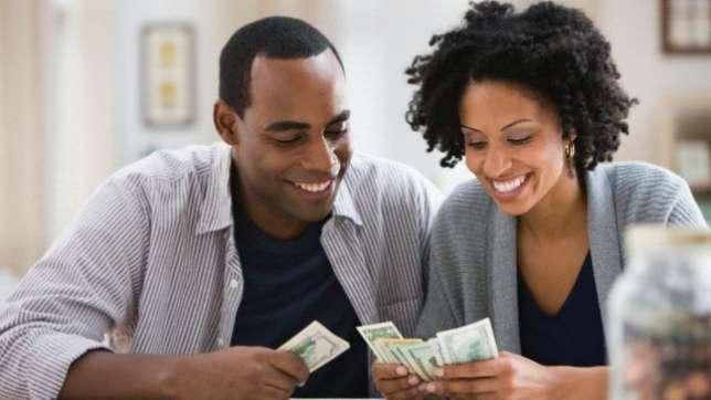 a couple counting money
