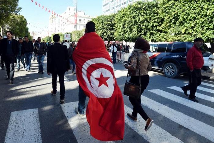 The anniversary of Tunisia's 2011 revolution is marked with rallies