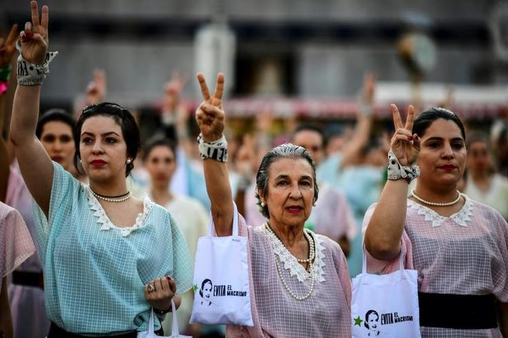 Women dressed as 1950's icon Eva Peron take part in a demonstration against President Mauricio Macri as campaigning for Argentina's October 27 elections heats up