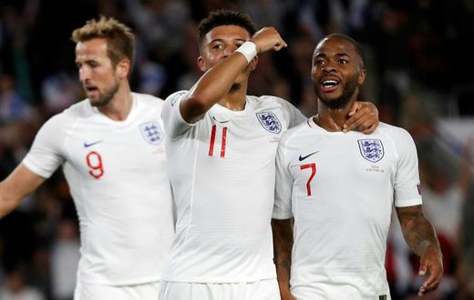 Talented trio: Harry Kane (left), Jadon Sancho (centre) and Raheem Sterling (right) have scored 14 goals in four Euro 2020 qualifiers