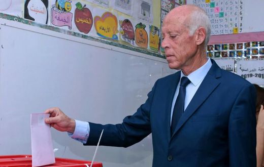 Presidential candidate Kais Saied casts his ballot at a polling station in Tunis on September 15, 2019