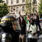 Undocumented migrants and supporters surged into the Pantheon memorial in Paris to demand that their situations be regularised