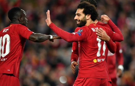 Liverpool star Mohamed Salah celebrates with Sadio Mane