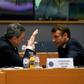 European Central Bank President Mario Draghi and France's President Emmanuel Macron (R) speaking before a meeting