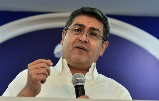 Honduran President Juan Orlando Hernandez gives a message to the nation at the presidential palace in Tegucigalpa on October 3, 2019 denying he took millions of dollars in bribes from drug lords