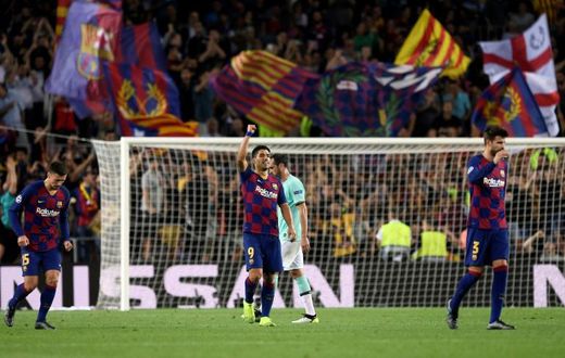 Barcelona forward Luis Suarez celebrates his second goal