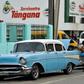 A man uses a funnel to fill his car with fuel from a drum in a Havana street, on September 12, 2019