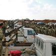Turkish-backed Syrian rebel fighters gather near the Syrian-Turkish border as Ankara threatened an offensive against Kurdish militias it considers terrorists