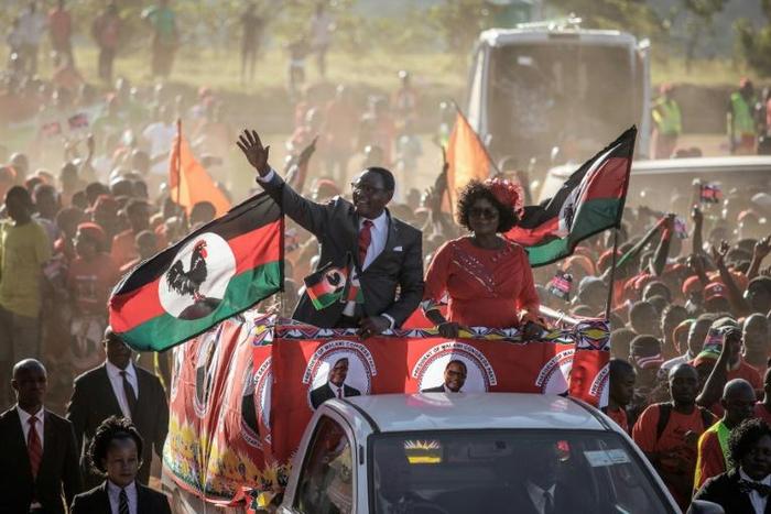 Opposition Malawi Congress Party (MCP) leader and presidential candidate Lazarus Chakwera (L) held his last campaign rally in Lilongwe