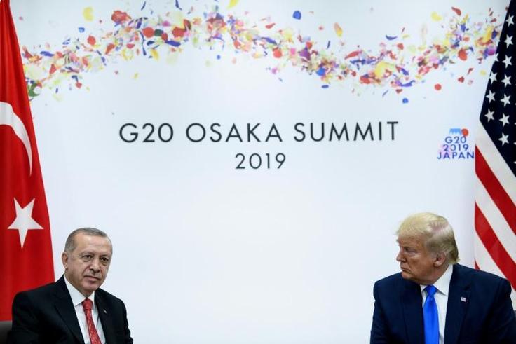 President Donald Trump told his Turkish counterpart Recep Tayyip Erdogan (L) Ankara's plans to buy the Russian S-400 missile defence system was "a problem, there's no question about it"