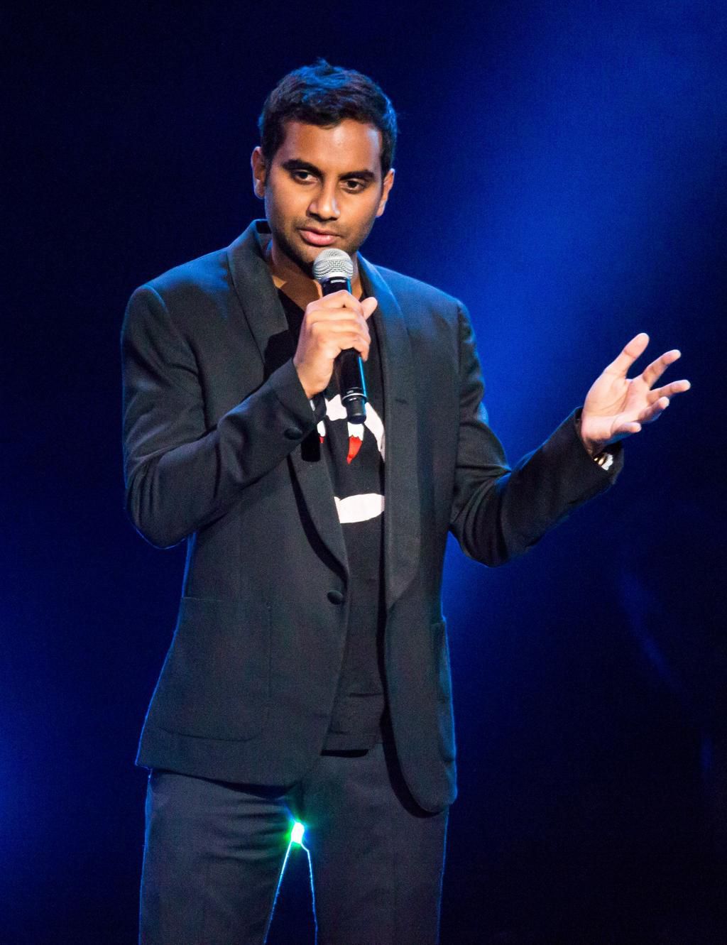 Aziz Ansari performing stand-up in 2015.