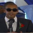 Andrew Kenneth lights up mourners at his grandmother, Rahab Muhuni's burial in Kirwara Gatundu