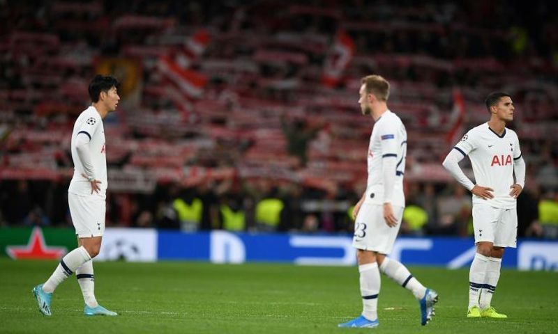 Tottenham players react after their 7-2 Champions League defeat against Bayern Munich