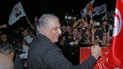 Tunisia's presidential candidate Nabil Karoui is greeted by his supporters after being released from Mornaguia prison near the capital Tunis ahead of Sunday's runoff