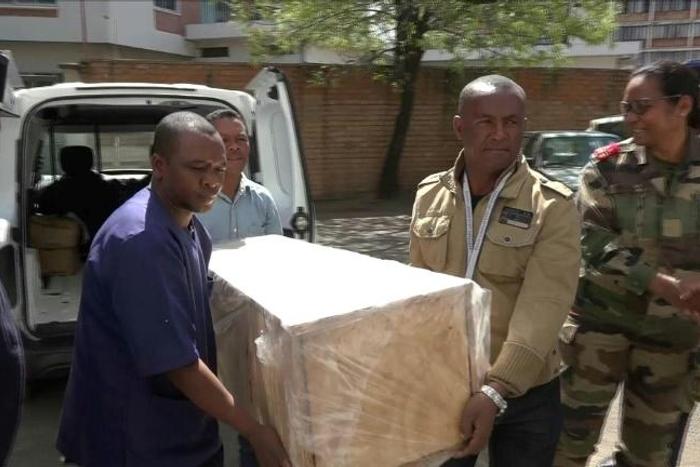 The coffin containing the remains of British Cambridge University student Alana Cutland was carried out from the morgue