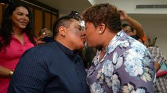 Alexandra Chavez (left) and Michelle Aviles have become the first same-sex couple to get married in Ecuador