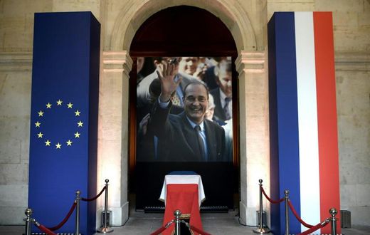 The coffin of former French President Jacques Chirac lies in state during a memorial ceremony at the Saint-Louis-des-Invalides cathedral at the Invalides memorial complex in central Paris on September 29, 2019
