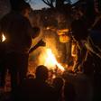 Protesters stand around a fire at a vigil against the result of the May 21 presidential vote in Lilongwe on July 4, 2019. Malawi's re-elected President Peter Mutharika has condemned the protests