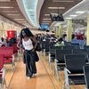 Lifestyle journalist and founder of Chic Chui Nillah Nyakoa at an airport [Image Credit: Nillah Nyakoa]