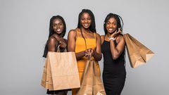 Young women with shopping bags