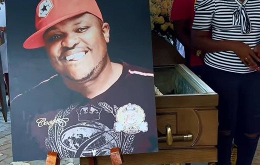 An image and casket of the late Xavier Jerry Nato