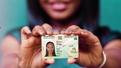 A person holding the new generation Kenyan ID card