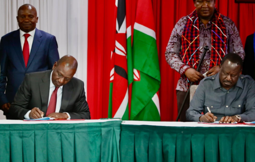 President William Ruto and Raila Odinga signing a political pact at KICC on March 7, 2025 with DP Kithure Kindiki and Senator Ledama Ole Kina standing in the background